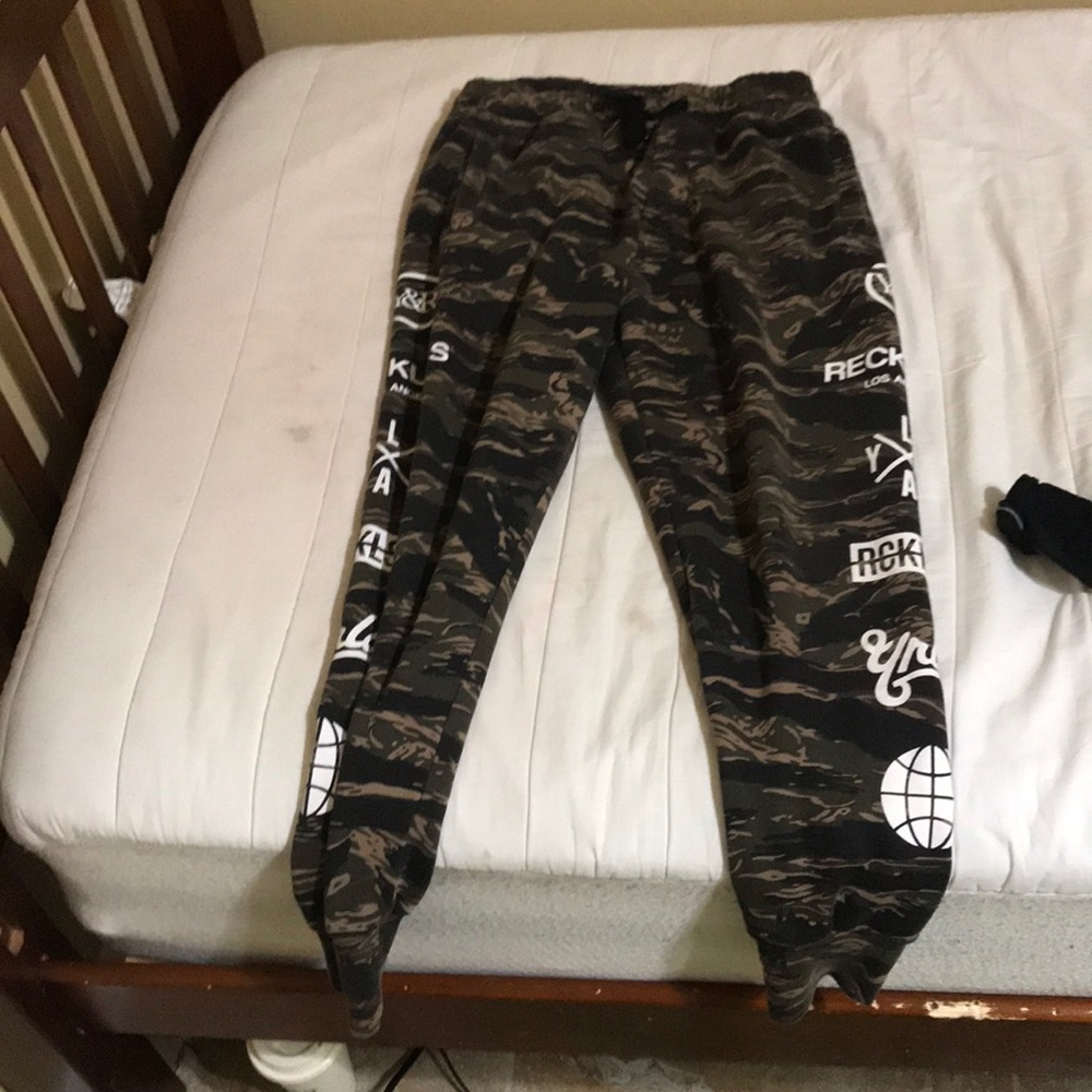 Young and Reckless, Tiger Camo pants.